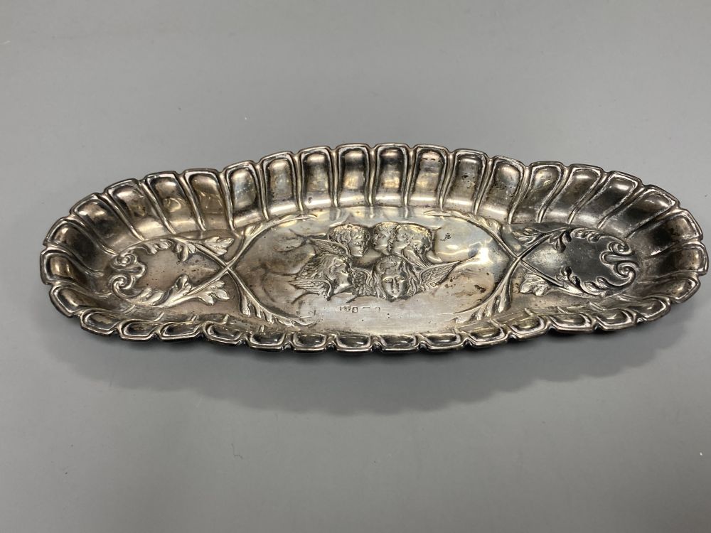 A George II silver meat skewer, John Harvey I, London, circa 1750, 28.5cm and an Edwardian silver Reynolds Angels pin tray,